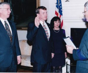 Being sworn in on the Economic Development Commission by Secretary of State John Willis as Governor Glendening looks on