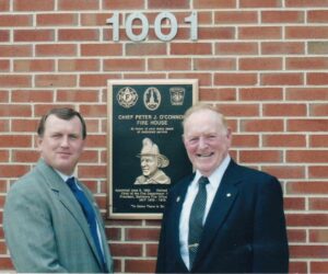 Kevin with his dad at the naming of the Chief Peter J O'Connor Firehouse in Baltimore.  Chief O'Connor served in the department for 40 years and held the top position from 1980--1992